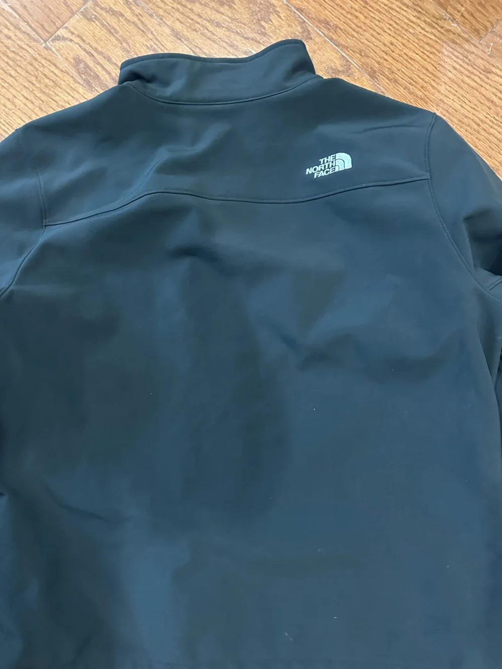 The North Face Men's Black Softshell Jacket with Zip Pockets